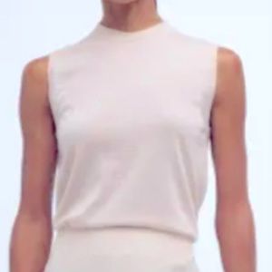 NEW - L - comfy, chic, and streamlined - this sleeveless sweater is a favorite.